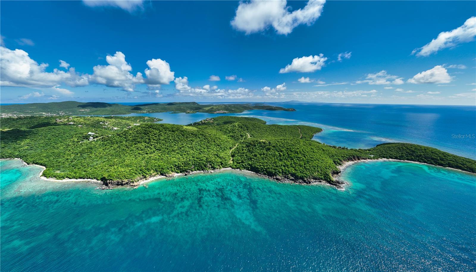 Discover an unparalleled opportunity to own a breathtaking 39-acre property in the beautiful Playa Sardinas Ward of Culebra Island. This unique property boasts stunning panoramic ocean views, making it the perfect canvas for your dream residential compound or vacation retreat. The property boasts exceptional oceanfront access. Enjoy 1,200 feet of pristine oceanfront with direct beach access, ideal for relaxation and recreation. Nestled between the sparkling Caribbean Sea to the south and east, and bordered by a 150-acre nature preserve, this land offers unmatched privacy and tranquility. Encompassed by Mar Caribe to the north and south, with breathtaking views of Cayo Luis Pena, Vieques and St. Thomas, the scenery is simply spectacular. This expansive property is not just a piece of land; it’s an invitation to embrace the extraordinary lifestyle that Culebra has to offer. With ample space for guest houses and unique architectural designs, you can create a vibrant family compound or an exclusive getaway destination. Don’t miss your chance to invest in this exceptional slice of paradise.