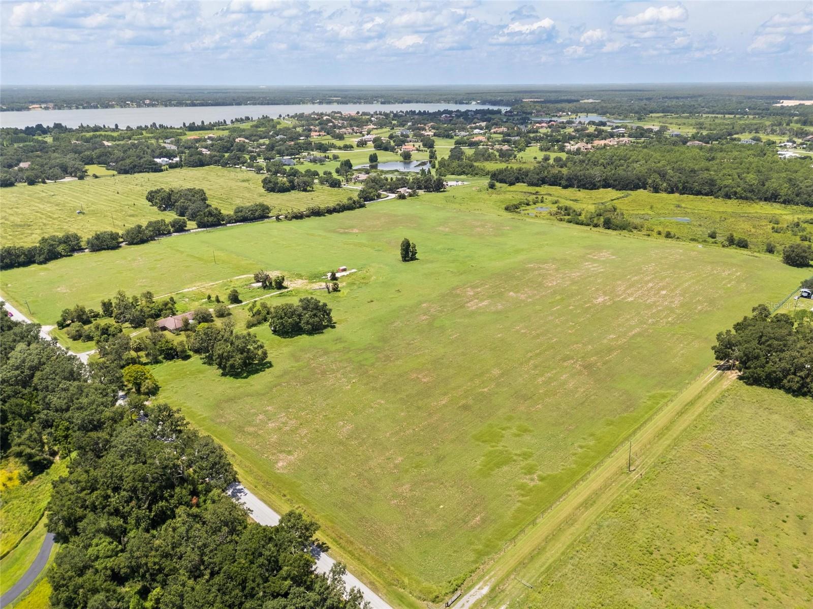 Presenting a rare and exceptional opportunity to acquire 39.4 acres of fully upland, flat terrain in one of the most desirable and fast-growing areas of Central Florida. This expansive property is zoned Agricultural Residential (AR) but comes with an approved Comprehensive Plan amendment for RES-1 zoning, allowing for up to 30 one-acre residential lots – ideal for a custom home community or private estate enclave.
Located directly adjacent to the prestigious Stonelake Ranch community, this parcel offers both exclusivity and investment potential. Enjoy the best of both worlds – a peaceful, nature-surrounded setting with easy access to Tampa, Orlando, top-rated beaches, major airports, parks, and lakes. Whether you're a developer, investor, or someone looking to create a unique residential retreat, this property delivers unmatched flexibility and value.