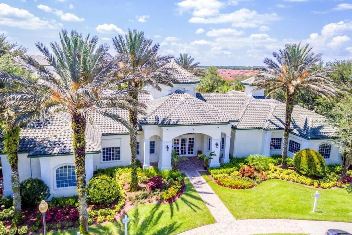 Experience the comfort and convenience of this cozy 2 bedroom, 1 bath condo located in the sought after, GATED Legacy Dunes community. *RENOVATED KITCHEN & NEW LUXURY VINYL FLOORING 2017* Positioned on the 3rd floor, this CASH FLOWING short term rental unit has lots of natural sunlight, an open floor plan and 12-foot ceilings! Situated just off the living room you'll find two spacious bedrooms and a bathroom. Step outside onto the balcony to enjoy the warmth of the Florida sun. Here you'll find a convenient storage closet perfect for pool accessories or sporting equipment. The community amenities are outstanding, featuring: two swimming pools, a splash pad, a new playground featuring swings, slides and a rock climbing wall, lighted tennis and basketball courts, a modern fitness center, a picnic area with BBQ grills, a car wash area, a golf chipping cage, indoor gaming room with ping pong, air hockey and pool table game, quiet walking trails around three lakes, and more. The condo fee covers water, sewer, trash, WiFi, pest control, and a door-to-door valet trash collection service, and nighttime guard security. Location is a major plus, just minutes from restaurants, shops & activities! Only 4 miles from the Disney Main Gate. This community offers flexibility for generating rental income through long-term or SHORT TERM rentals, or as a comfortable permanent residence. Come see for yourself what this home has to offer!