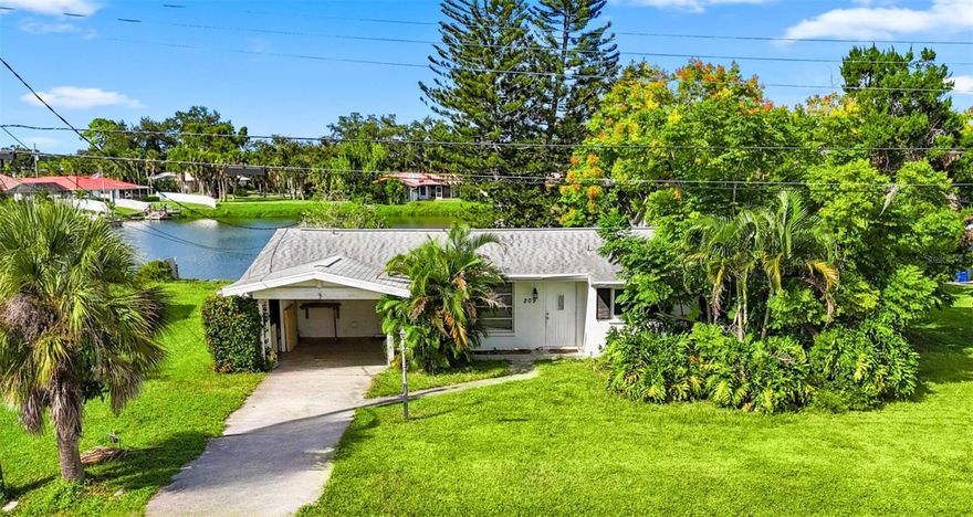 Beautiful lakefront home in Venetian Gardens neighborhood. Home has 3 bedrooms and 2 bathrooms with attractive and easy to care for terrazo floors throughout most of the home. Bonus room in the back has classy wood beam ceilings. The back yard is very relaxing with gorgeous lake views and a nice shed for storage. Located close to Sarasota in a very peaceful location near the end of a dead end street with very little traffic. No HOA or deed restrictions. Roof  was replaced in August 2015.