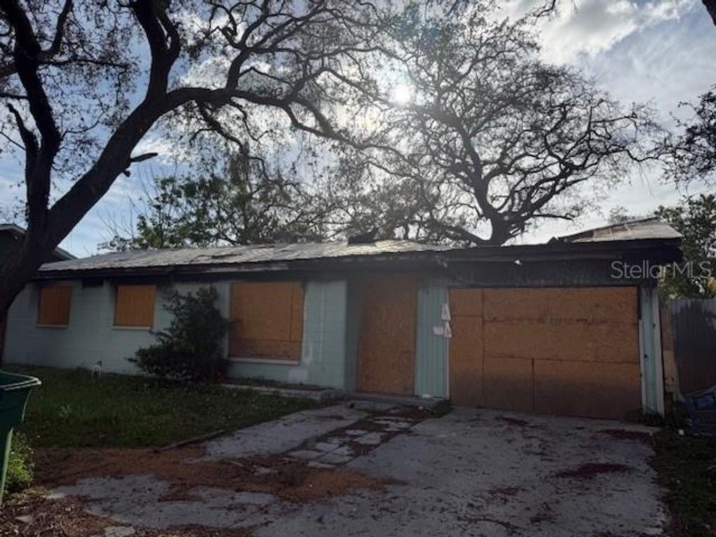 Photo of 10706 N Central Avenue, Tampa, FL 33612 (MLS # C7523051)