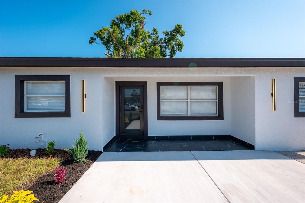 Photo of 8217 Tanglewood Lane, Tampa, FL 33615 (MLS # TB8411018)