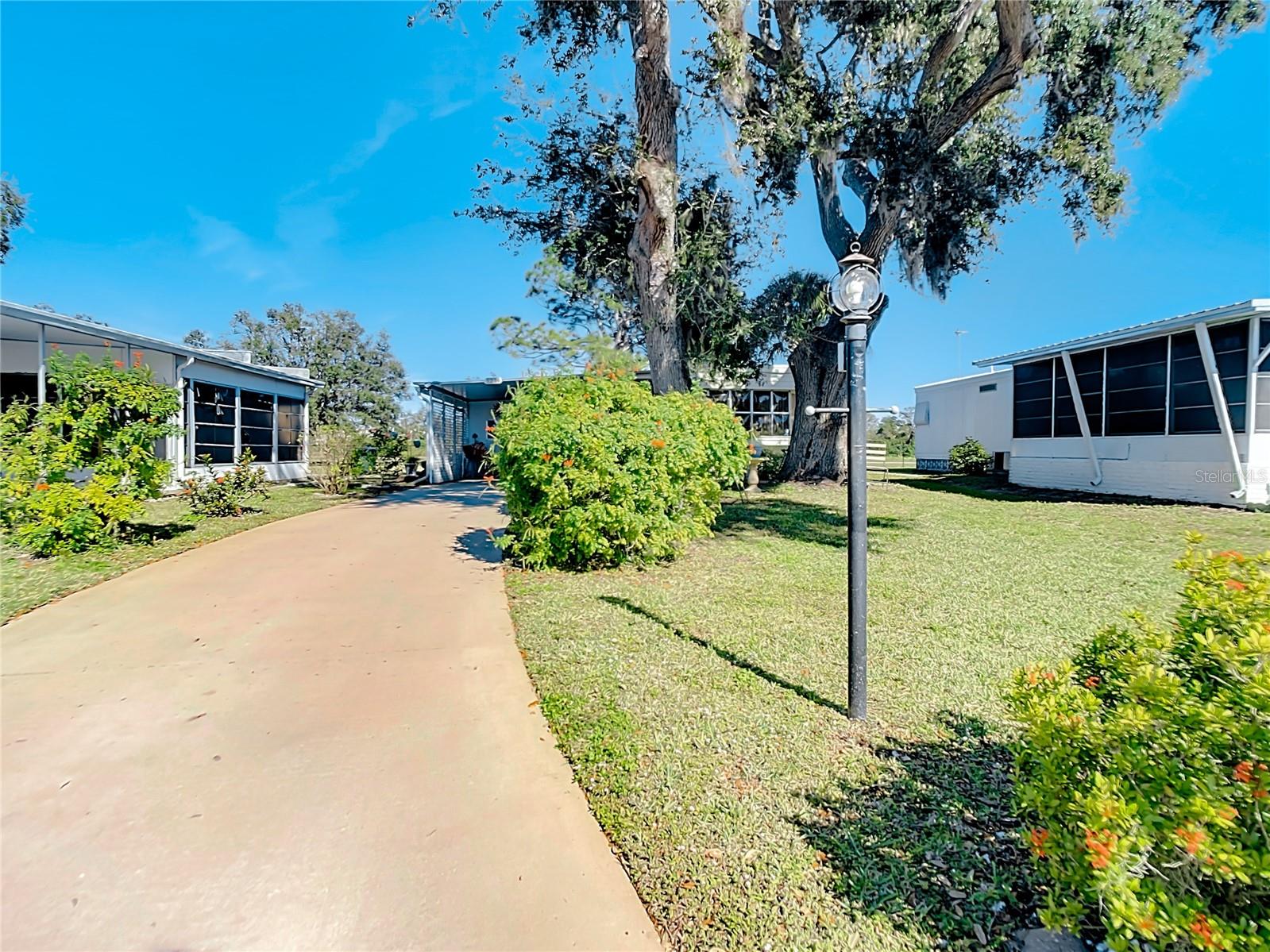 CHARMING, UNIQUE, MOBILE HOME IN FABULOUS HOLIDAY PARK, A 55+GATED COMMUNITY WITH NO HOA!!! HOME IS BEING SOLD TURNKEY FURNISHED WITH THE EXCEPTION OF A FEW PERSONAL ITEMS. NO LOT FEES IN THIS COMMUNITY, YOU OWN THE LAND!! THIS 3 BEDROOM, 1.5 BATH IS SPACIOUS, CLEAN, AND BRIGHT. OVERSIZED ENCLOSED FLORIDA ROOM IS HEATED AND COOLED FOR YEAR ROUND USE. ALL NEW ELECTRICAL PANEL WITH SURGE PROTECTOR WAS RECENTLY INSTALLED, NEW WASHER/DRYER AND HOT WATER HEATER. NEW GARBAGE DISPOSAL, PAVERED BACK LANAI, AND AN OUTDOOR SHOWER. GOLF CART IS INCLUDED WITH THIS HOME FOR GETTING AROUND THIS VERY ACTIVE COMMUNITY. HOLIDAY PARK AMENITIES INCLUDE 2 HEATED POOLS, FITNESS CENTER, TENNIS AND PICKLE BALL COURTS, SHUFFLEBOARD, HORSESHOE PITS, BOCCE, PING PONG TABLES, BILLIARDS ROOM, CERAMICS BUILDING WITH KILN, AND SO MUCH MORE. THIS COMMUNITY IS LOCATED IN THE HEART OF NORTH PORT AND WALKING DISTANCE TO SHOPPING AND RESTAURANTS. Bedroom Closet Type: Built In Closet (Primary Bedroom).
