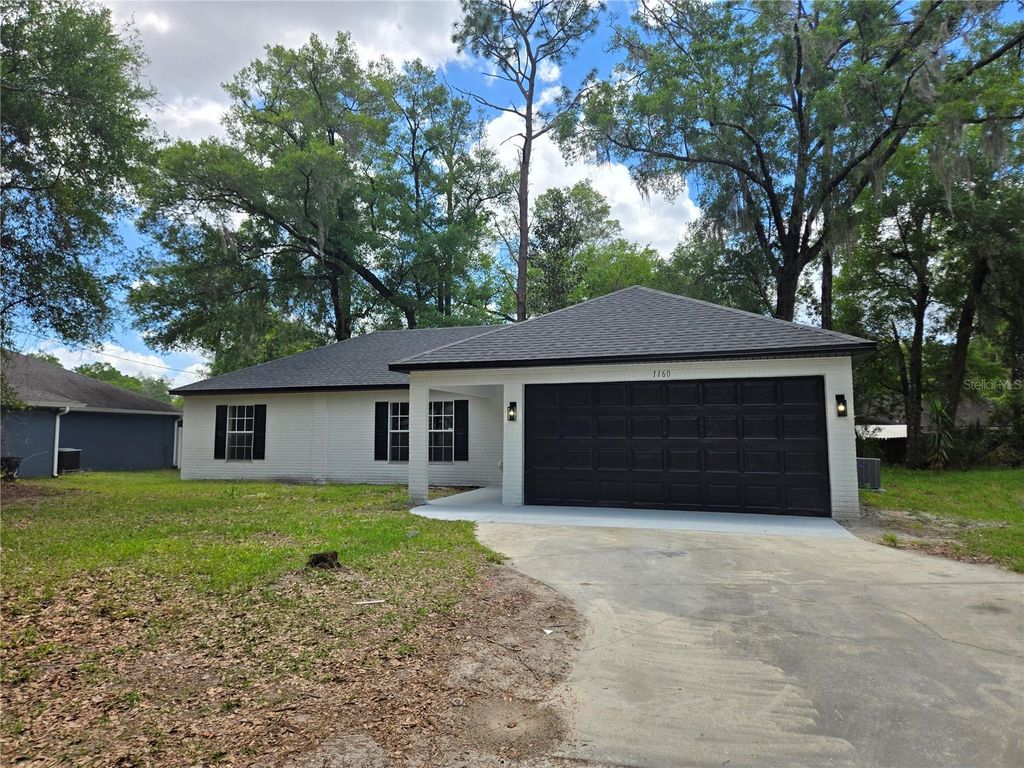 Photo of 1160 W New York Avenue, Orange City, FL 32763 (MLS # V4948499)