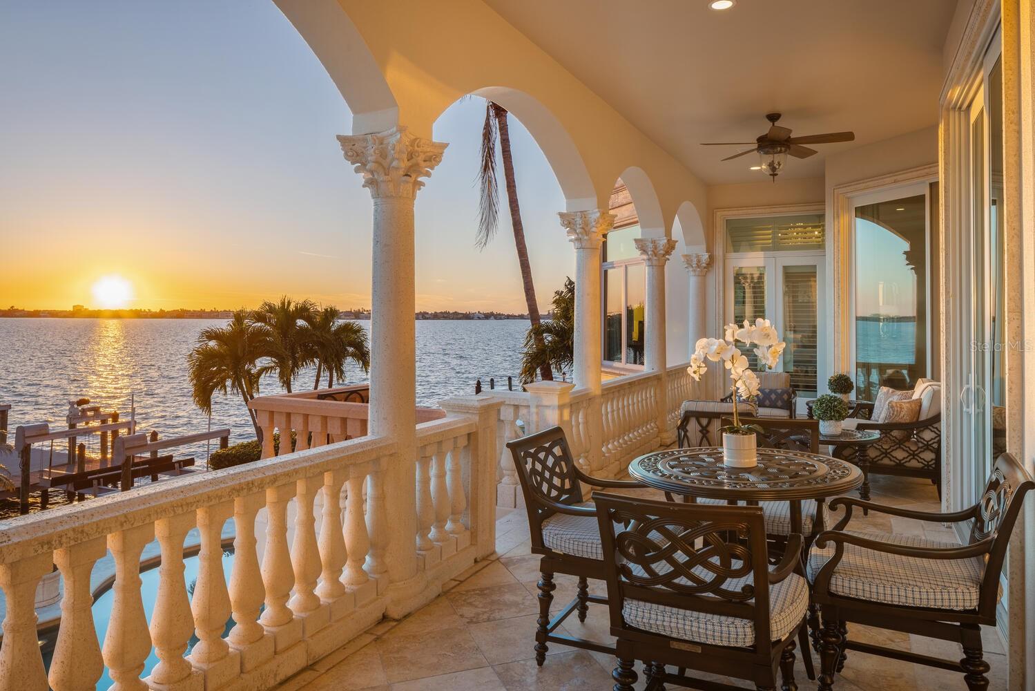 Poised on Sarasota Bay appreciating enchanting azure views, the epitome of a lavish boating lifestyle in unrivaled grandeur is defined throughout this palatial estate. Boasting desirable exclusivity in the Harbor Acres community with prestigious quality and exquisite beauty harmonize with style and class for a discerning life in paradise. Every imaginable need and desire are exceeded with the highest level of detail and execution throughout the 6,000-plus square foot home, ideal for indoor-outdoor living and entertaining. Mesmerizing embellishments and purposeful features lend to form and functionality on a monumental scheme across all three floors of the residence, including stunning staircases, purposeful built-ins, high-end materials and finishes, a gorgeous fireplace, and picture windows and disappearing sliders that bring you to the water’s edge. Formal and casual spaces to relax, gather with family and host special occasions are found dripping in refined appointments, from the dreamy chef’s kitchen to the elaborate pool deck for sunbathing, swimming and venturing to the dock for boarding your vessel. A full-equipped office, flexible media room, second master bedroom and two resort-style guest suites afford comfort and versatility to lifestyle preferences for everyone. The glamorous master retreat exudes self-pampering with a peaceful area for reading or reflection and a marble-clad spa en-suite bath showcasing an arched entry, soaking tub, built-ins, and walk-in shower. A tropical oasis experience, the outdoor living spaces are as distinguished as the rest of the home, featuring terraces on the second and third levels, a cabana-style lounge area, a putting green, and a large pool with spa, completely surrounded by lush landscaping and swaying palms. A spacious dock out to the water grants holding space for numerous watercrafts or a yacht for exploring the bay and open Gulf waters. Harbor Acres is a premier community in proximity to St. Armands Circle, Southside Village and a brief drive or stroll to downtown Sarasota. Beaches, shopping, and cosmopolitan living are only moments away. Recent improvements include new roof completed March 2025, new pool equipment with natural gas heater, rear landscaping, irrigation and landscape lighting. New dock with 65k pound boat lift. The home did not experience any interior damage from the last storm season.