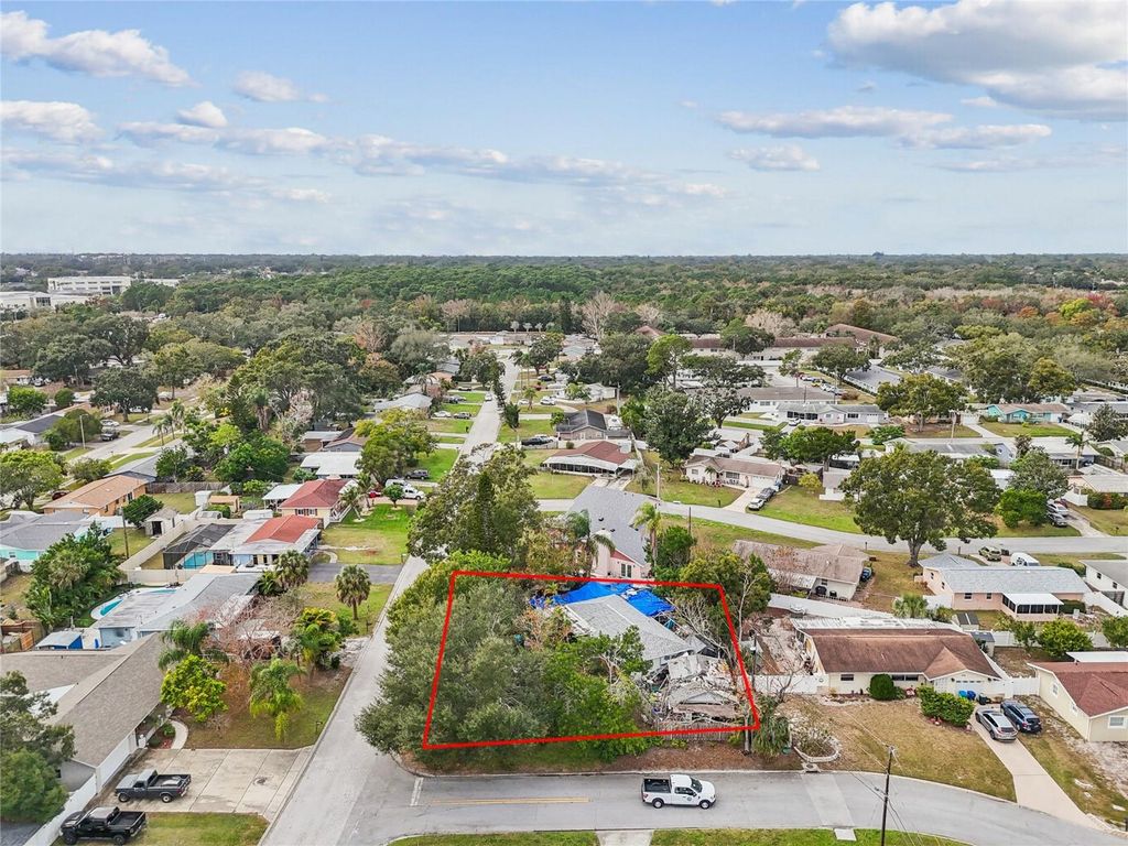 Photo of 11071 Village Green Avenue, Seminole, FL 33772 (MLS # TB8458240)