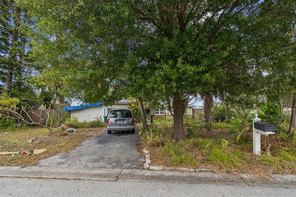 Photo of 11071 Village Green Avenue, Seminole, FL 33772 (MLS # TB8458240)