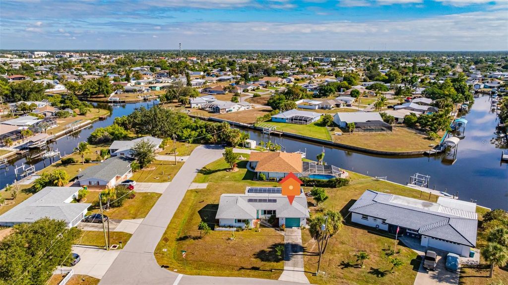 Photo of 199 Carlisle Avenue NW, Port Charlotte, FL 33952 (MLS # C7519029)