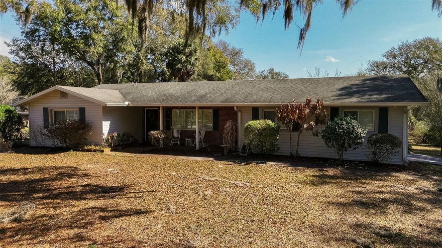 Rare opportunity in sought after south DeLand McGregor Road area. This solid built 3 bedroom 2 bath home sits high and dry on almost
5 acre! Side entry oversized 1 car garage. No HOA! Fenced and cross fenced. Great for horses!

Enjoy quiet mornings or evenings relaxing on the screened in back porch that overlooks this incredible setting. Beautiful Recently renovated kitchen that flows through to the dining/ living room area. The third bedroom is currently used as an office off the laundry room area. Would also make a great craft room!  Bahama shutters and blinds through out as well as LVP flooring giving this home a fresh and inviting style.
(Home is concrete block. The vinyl siding is for aesthetics). 
Easy access to
I4. Very close to Beresford Park and walking trails. Just a short distance to award winning downtown DeLand!