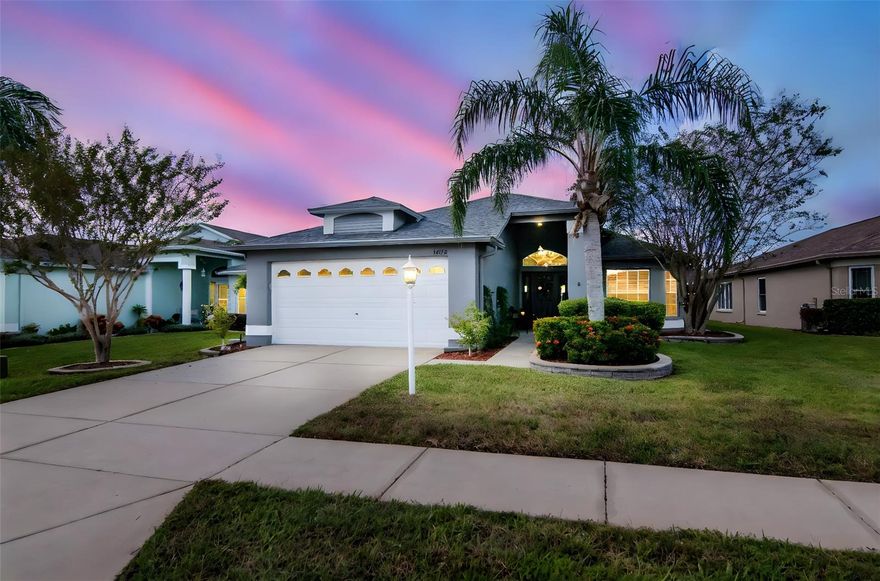 Live where peace of mind and resort-style living come together. Welcome to Heritage Springs, a premier 55 and over private gated golf community in Trinity, offering resort-style amenities, a golf cart lifestyle and hometown feel.
This beautifully updated single-story home features elegant travertine-look tile throughout, soaring ceilings, arched details, crown molding, and abundant natural light. The remodeled chef’s kitchen showcases high-end custom cabinetry, granite countertops, and a 2023 double convection oven with induction cooktop, perfect for those who love to cook. Both bathrooms have been updated with modern vanities and finishes. 
Step outside to an enclosed lanai overlooking stacked stone garden beds and a paver patio. Other updates: roof (2018), A/C (2024), water heater (2025), washer/dryer (2024), blinds (2024), heat pump (2024), cooktop/oven (2023), and garage opener (2024).
Bonus: A golf cart is included. Residents use carts to visit friends, enjoy tennis, golf, the pool, and the clubhouse—where the chef-driven dining experience is the talk of the community.
As a bundled golf community, homeowners are equity members and share the enjoyment of the resort-style amenities. Membership provides access to the private golf course, fee options available based on frequency of play. All within a secure gated community, minutes from beaches, Tampa International Airport, and HCA Florida Trinity Hospital.