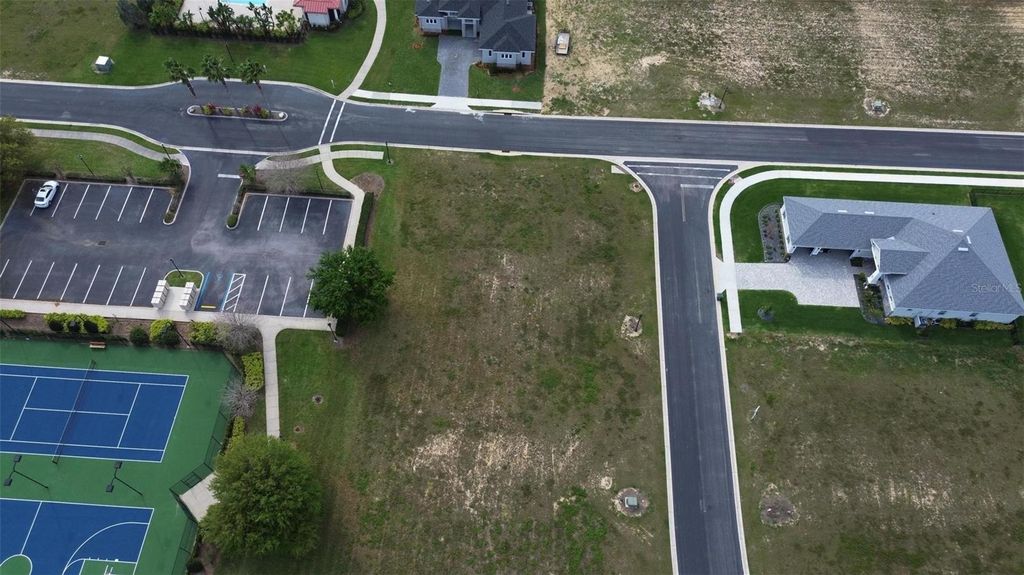 Photo of 229 Snowy Orchid Way, Lake Alfred, FL 33850 (MLS # O6368482)