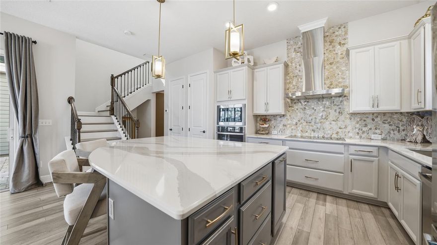 Built in 2020, this beautifully maintained 3 bedroom, 2.5 bathroom home offers a perfect blend of modern design, comfort, and everyday functionality in a highly convenient Jacksonville location. The main level features an open concept layout with abundant natural light, creating a bright and inviting space ideal for both relaxing and entertaining. Luxury vinyl plank flooring runs throughout the downstairs, leading into a well appointed chef’s kitchen complete with a large center island, ample cabinetry, and plenty of prep space for hosting family and friends. Just off the main living area, the private courtyard creates a seamless indoor outdoor flow and is perfect for entertaining, grilling, or simply enjoying a quiet evening at home. A convenient half bath is located on the first floor, along with a thoughtfully designed drop zone/mudroom just off the oversized two car garage, making daily routines seamless.
Upstairs, a spacious loft provides flexible living space that can be used as a home office, media room, or play area. The split bedroom floor plan offers added privacy, with a generously sized primary suite featuring a comfortable sitting area, double vanity bathroom, and a large walk-in closet. The secondary bedrooms are well sized and share a full bathroom, while the upstairs laundry room adds an extra layer of convenience to everyday living.
Situated in a gated community with a resort style pool and lawn maintenance included, this home offers a low maintenance lifestyle in one of Jacksonville’s most accessible areas. You’re just 5 minutes to I-295 and less than 10 minutes to St. Johns Town Center, Costco, and a wide variety of shopping, dining, and entertainment options, making this location hard to beat.

All information pertaining to the property is deemed reliable, but not guaranteed. Information to be verified by the Buyer. Be advised that cameras may exist recording audio and video inside/outside the property, such as ring doorbells. Photos are digitally enhanced and could be altered, please verify.