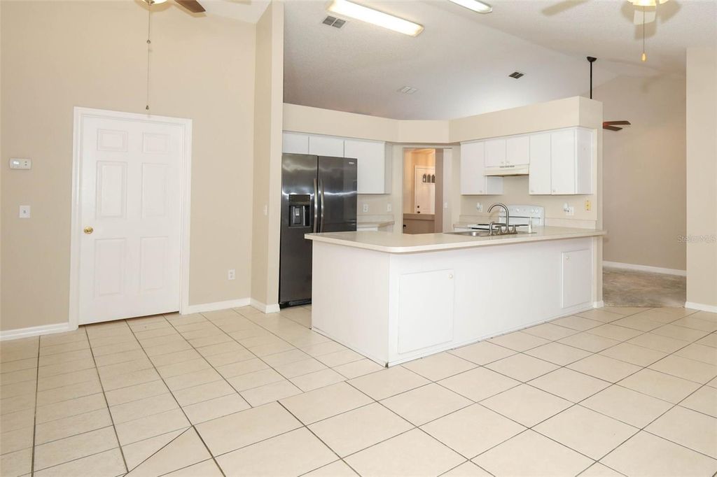 Photo of 997 Yellowbird Avenue, Deltona, FL 32725 (MLS # O6351445)