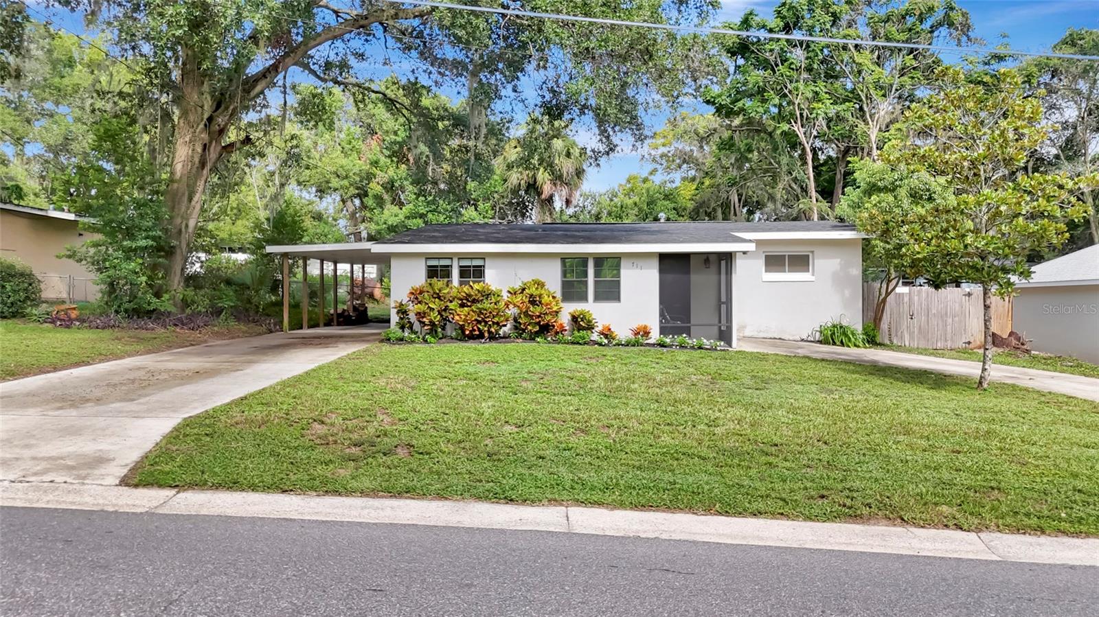 This updated, move-in-ready gem has been remodeled from top to bottom with style and comfort in
mind. Enjoy extended covered parking for guests and a screened front patio that opens to wood-
look tile floors, designer lighting, and windows that fill the home with natural light. Major
updates give you peace of mind: newer roof (2019), HVAC (2019), hot water heater (2019), and
modern appliances. Bathrooms feature custom tile, and bedrooms include premium carpet and high-
end finishes. The kitchen is a showstopper with granite countertops, solid cabinetry, and a
subway tile backsplash. An interior laundry room with washer and dryer (Included) makes life
easy. Step outside to a spacious yard with a concrete patio—perfect for barbecues, entertaining,
or relaxing evenings. Modern, turn-key, and stylish.