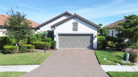 Photo of 12416 Parigi Way, Sarasota, FL 34238 (MLS # A4665738)