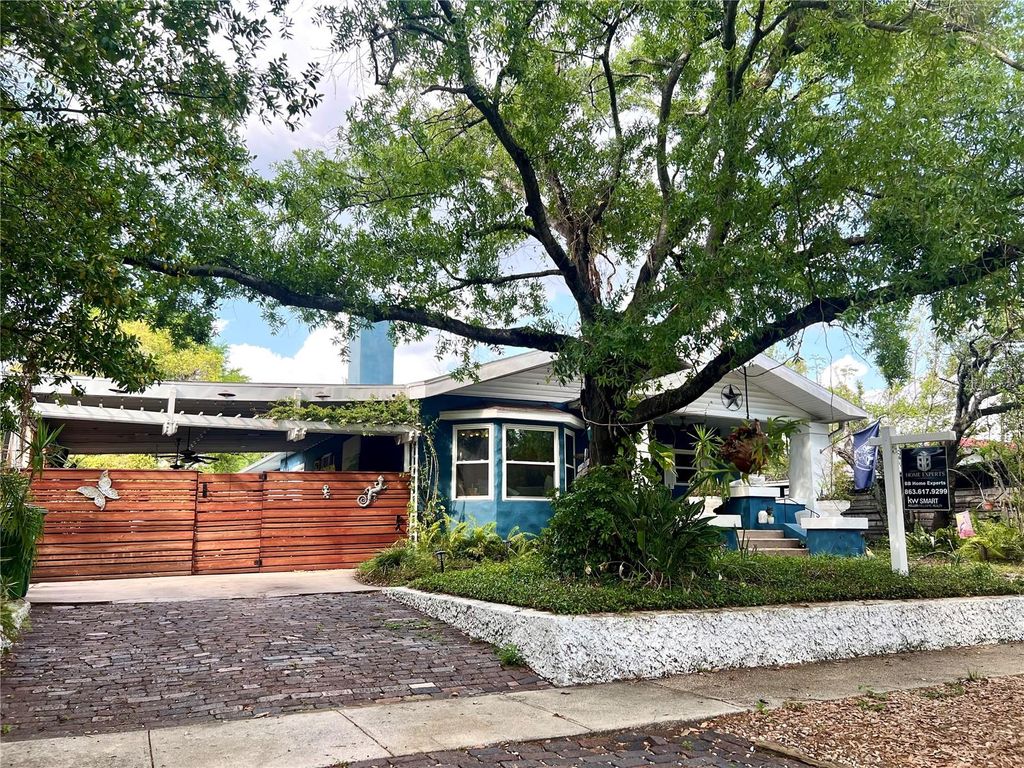 Photo of 105 W Comanche Avenue, Tampa, FL 33604 (MLS # L4960077)