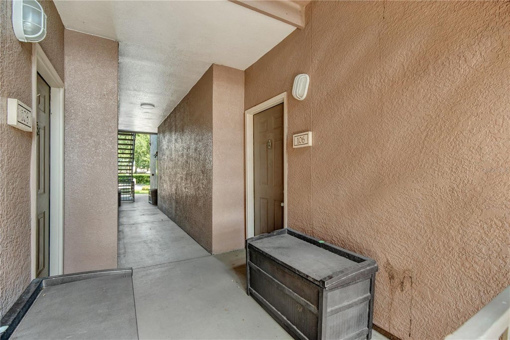 Photo of 6137 Metrowest Boulevard #106, Orlando, FL 32835 (MLS # O6443888)