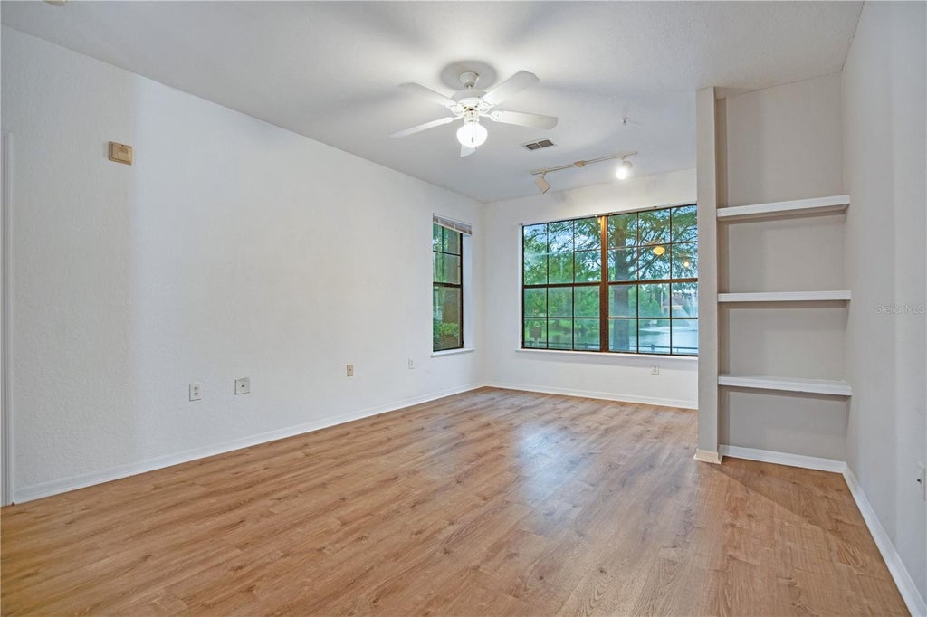 Photo of 6137 Metrowest Boulevard #106, Orlando, FL 32835 (MLS # O6443888)