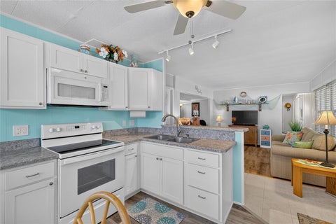 Tiny photo for 565 Tammi Drive, Leesburg, FL 34788 (MLS # G5119328)