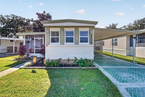 Photo of 565 Tammi Drive, Leesburg, FL 34788 (MLS # G5119328)