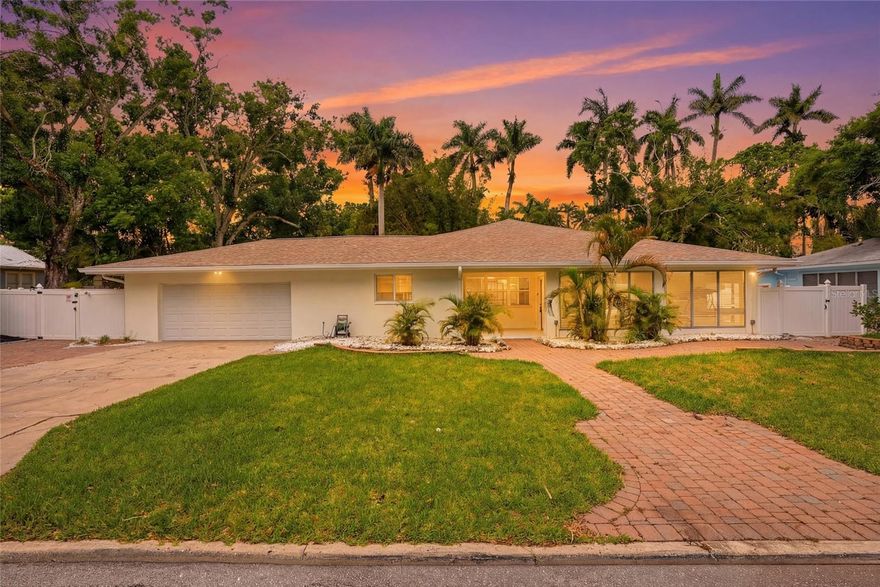 Welcome to 2004 Virginia Drive in Bradenton - a beautifully updated home just a short walk from the Village of the Arts, downtown, the Marina District, and the scenic Riverwalk, offering the best of Florida living. This spacious residence features over 2,700 square feet of thoughtfully designed living space filled with natural light and modern, organic finishes throughout. A charming front sunroom greets you, perfect for morning coffee, while impact-rated windows, an updated HVAC system, and a 2021 roof provide comfort and peace of mind. The split floor plan offers a private primary suite with a walk-in closet and en-suite bath with dual sinks, while two additional bedrooms are located on the opposite side. A second rear sunroom adds flexibility for a fourth bedroom, office, or bonus space. Outside, enjoy a fully fenced backyard with lush native landscaping and room for a pool, along with a two-car garage, ample storage, and plenty of parking for guests, boats, or recreational vehicles. Boating enthusiasts will appreciate rare riparian rights with Gulf access, including approximately 12 deeded feet of waterfront on Warner Bayou with depths ranging from 4 to 10 feet and direct access to the Manatee River and Gulf of Mexico, with potential for a dock or lift (buyer to verify). Ideally located near top-rated schools, shopping, dining, Robinson Preserve, Fort De Soto Park, and the beaches of Anna Maria Island, this home also offers easy access to downtown Bradenton and I-75 - schedule your private tour today to experience everything this exceptional property has to offer!!