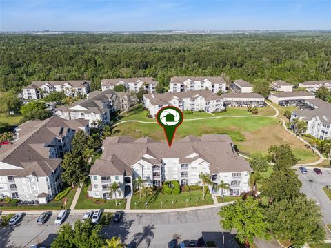 Photo of 2302 Butterfly Palm Way #201, Kissimmee, FL 34747 (MLS # S5147156)
