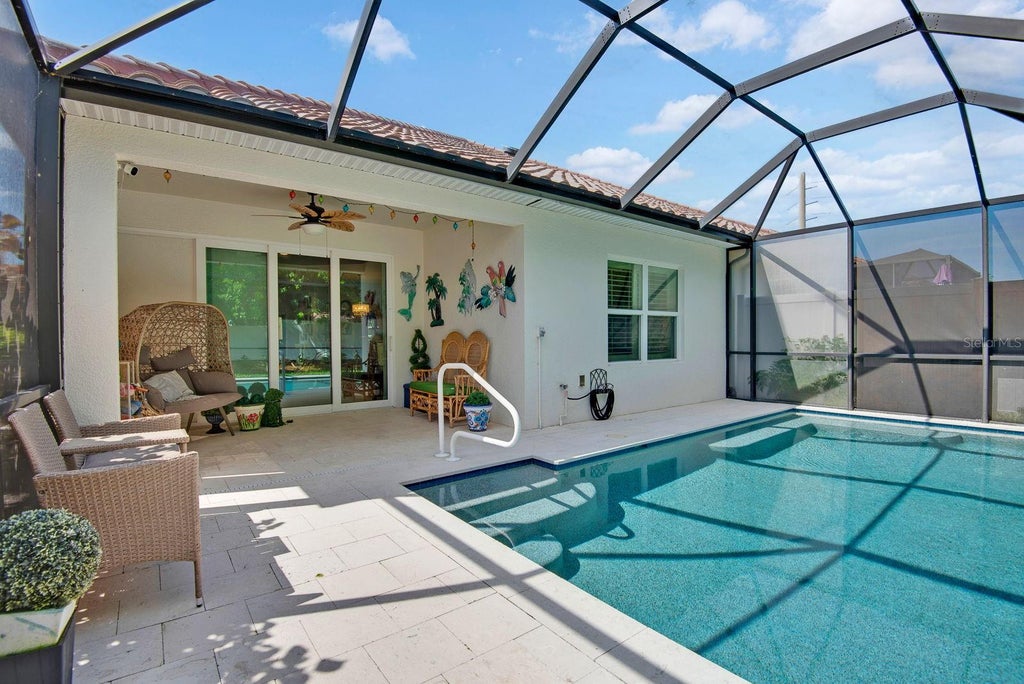 Photo of 7010 Playa Bella Drive, Bradenton, FL 34209 (MLS # A4703715)