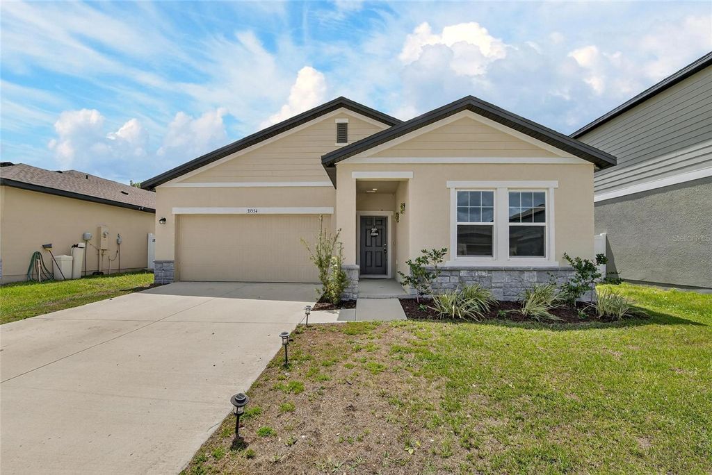 Photo of 35554 Eastbrook Avenue, Zephyrhills, FL 33541 (MLS # TB8490039)