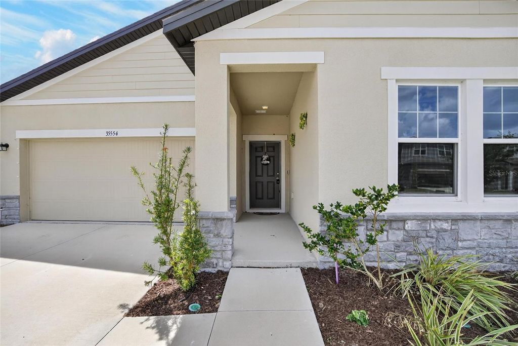 Photo of 35554 Eastbrook Avenue, Zephyrhills, FL 33541 (MLS # TB8490039)