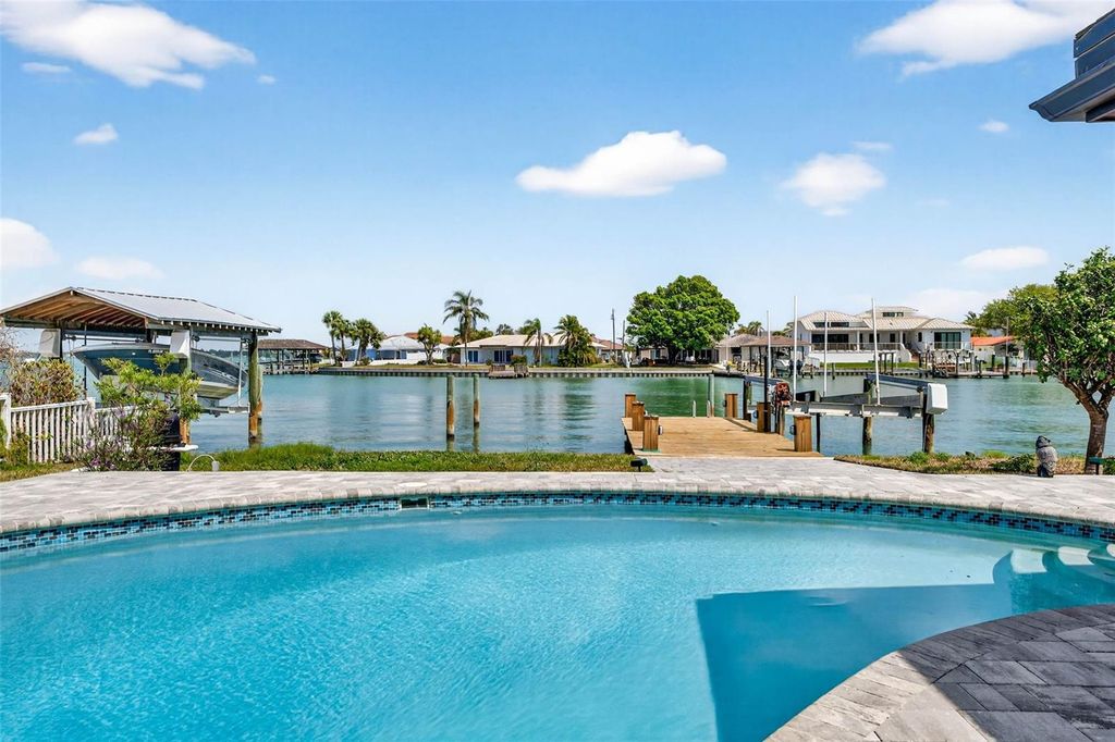 Photo of 319 Midway Island, Clearwater Beach, FL 33767 (MLS # O6394704)