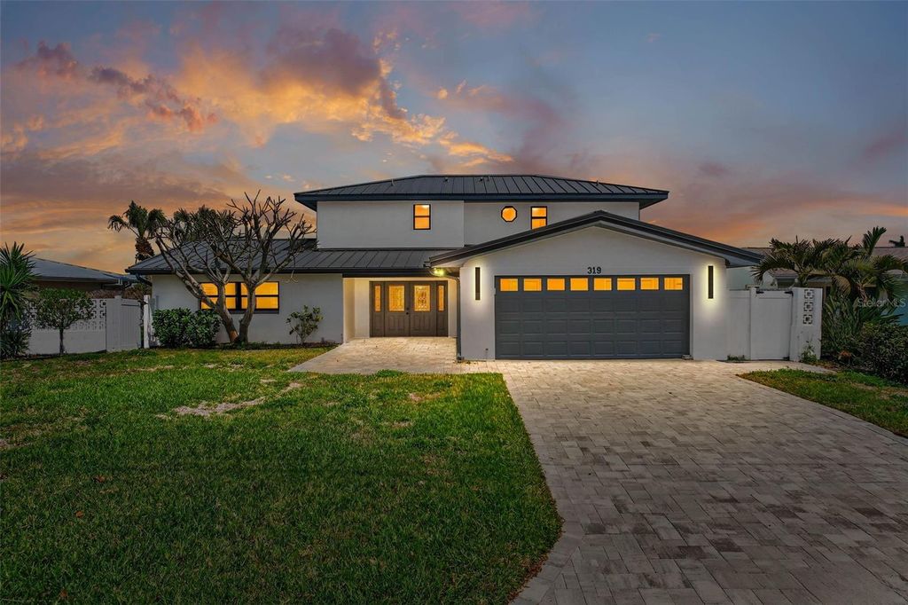 Photo of 319 Midway Island, Clearwater Beach, FL 33767 (MLS # O6394704)