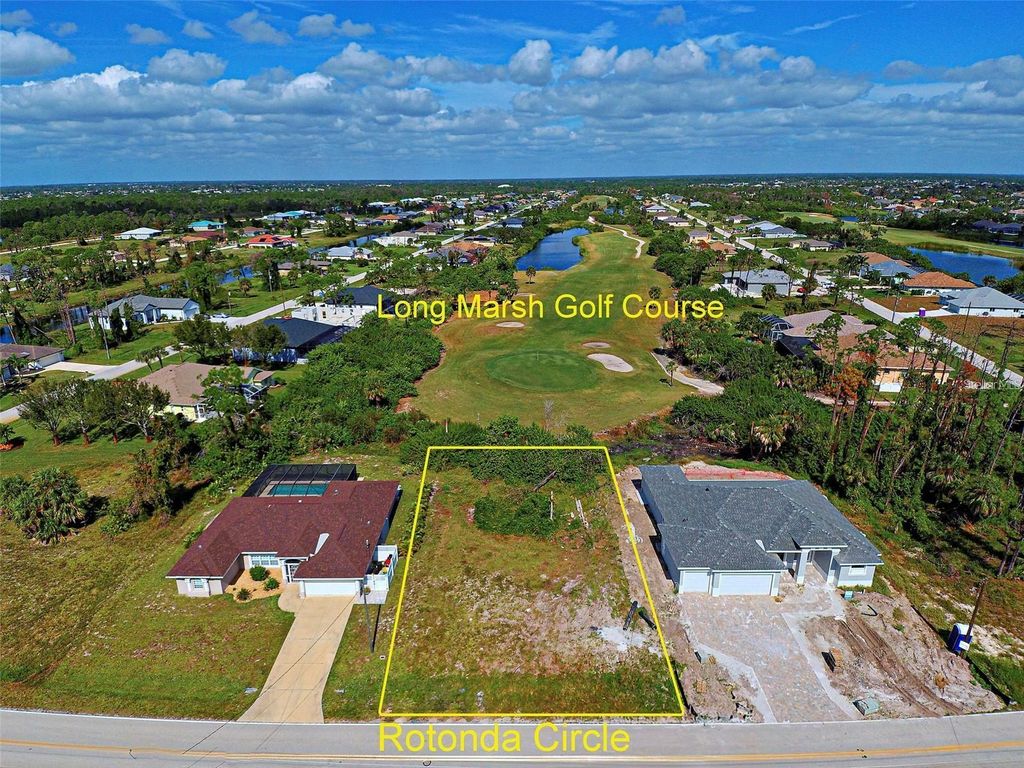 Photo of 1164 Rotonda Circle, Rotonda West, FL 33947 (MLS # N6141454)