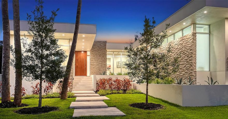 This stunning contemporary home with Guest House combines convenient secure living in a home built to the latest codes with living in the sought after historic community of Indian Beach. This lovely established neighborhood is known for it's "Old Florida" feeling with its extraordinary tree canopy, lush vegetation, and the mixture of impressive mansions, eclectic and modern homes. The Main House offers 3 bedrooms, each with en-suite bath plus a office/den, a powder room and a 3-car garage. The open great room, kitchen and dinning room seamlessly lead to the very private covered terrace, pool and spa area with southern orientation. The separate Guest House in the back is designed as a Studio with full bath, walk-in-closet, kitchenette and offers ample privacy for guests. All concrete block construction and custom high-end materials are used for this home. Situated in popular Indian Beach, which is also referred to as the Museum Area, because it stretches "West of Trail" just North of Downtown Sarasota along the Sarasota Bayfront to South of the Ringling Museum and Ca'd'Zan. Downtown Sarasota, Sarasota-Bradenton Int'l Airport, New College of Florida, USF Sarasota Manatee Campus, Jungle Gardens, St. Armand's Circle and Lido Beach are just a short drive away. This neighborhood offers waterfront parks with beautiful views of the Bay for everyone to enjoy.