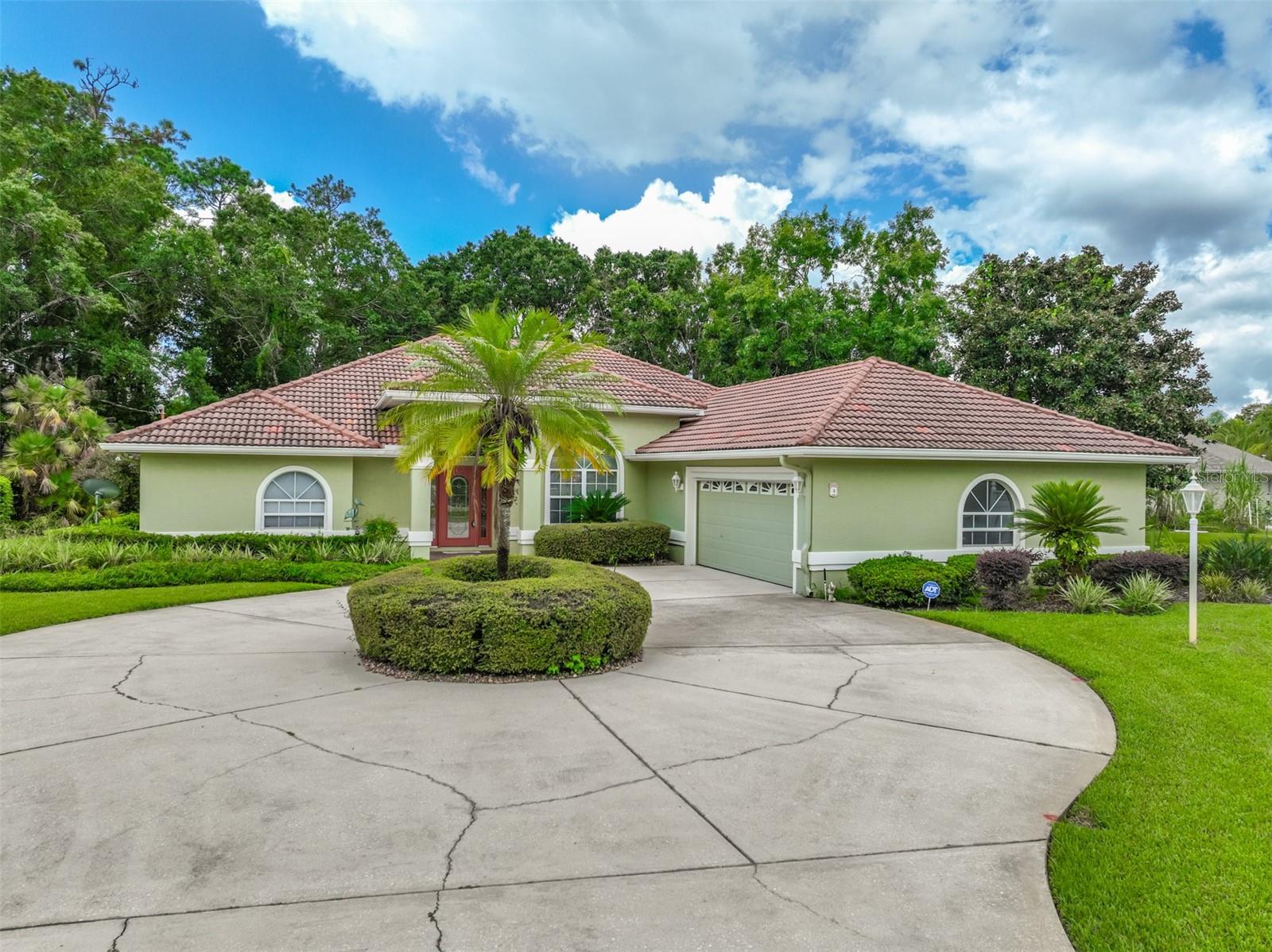 From the moment you walk thru the leaded front door you'll know this one-owner home is special and holds wonderful memories.
There's 4 Bedrooms and 2 baths inside and a 1/2 bath located conveniently by the pool. The primary Bedroom has trey cielings, a slider to the lanai, garden tub, 2 sinks and a vanity. There's a formal dining room, and a living room, along with a kitchen nook with a mitred window that offers a view of the mature landscaping and heated pool. A large family room and 3 guest rooms complete the package. There's plenty of room for those that work from home. The courtyard style garage has a roll down screen for added ventilation and privacy.
Make an appointment today. Please note the interior pictures are prior the Estate Sale