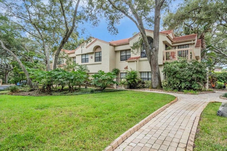 Come take a look at this beautiful 3 bedroom, 2 bath condo now on the market in the Los Prados community.  It is spacious with over 1200 square feet and has many upgrades.  You will love the granite countertops and newer flooring.  This corner unit has plenty of windows to let in light.  The condo is all one level, on the ground floor, with a welcoming front porch where you can look out onto the pond.  This property is also toward the back of the complex near the nature preserve next door.  The owners have access to this preserve - through a gate leading from the condos to Folly Farm. You are also near Safety Harbor's Main Street area with many eclectic restaurants and shops.  Close by are the downtown park, library, and Safety Harbor Spa just waiting to be explored! Don't miss this opportunity to become part of this amazing community.