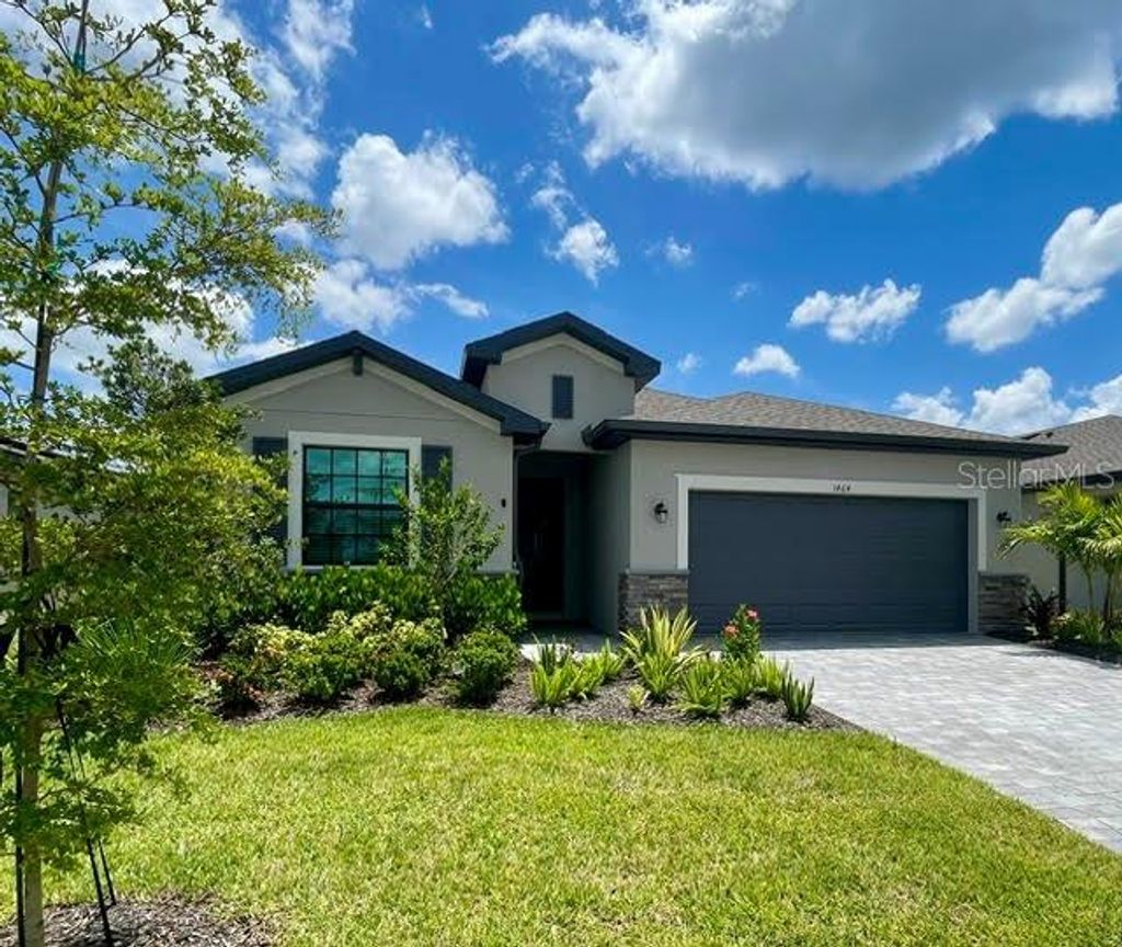 Photo of 1464 Saddlewood Circle, Port Charlotte, FL 33953 (MLS # C7513035)