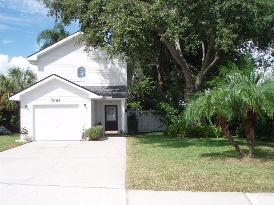 3 bedroom 2 bath 2 story garage home in great location. Innovative design at time of construction with foam covered concrete walls for energy efficiency and noise reduction. New roof December 2024. New garage door opener. New hot water tank May 2025. Brand new LVP flooring in living room. Screened patio with new sliding glass doors. Air conditioner replaced November 2016. 11 miles to Clearwater Beach, 15 miles to Tampa International Airport, 7.5 miles to St Pete/ Clearwater Airport and less than 3 miles to the Ream Wilson Trail for biking, jogging and skating. Home did not flood during Hurricane Helene and is not in a flood insurance mandated flood zone. Large, landscaped yard. Publix nearby with numerous restaurants in the area. Room dimensions are approximate and should be verified.