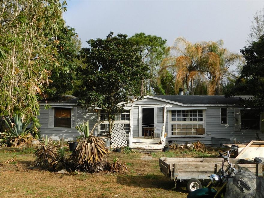 Investor Special! Land Value Only – Home Has Little to No Value
1.22 secluded acres located on the northeast side of Zephyrhills, sitting at the end of a quiet dead-end road. This property includes a doublewide mobile home, newer power pole with electric, 1 well, and 2 septic systems (all currently working but not warranted).
The home may offer repair or rehab potential, but the primary value is in the land and existing utilities. With privacy, utilities already in place, and the flexibility of a rural setting, this property is ideal for investors, flippers, or anyone looking for a future homesite.
CASH OFFERS ONLY. Property is owner-occupied — appointments required. Please do not enter property without your agent present.