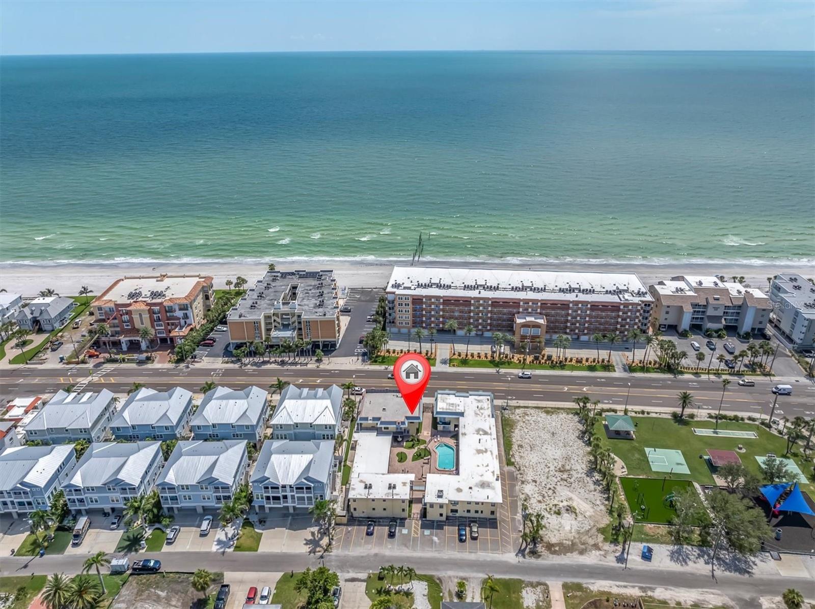 Income producing short term rental!! This highly desirable second-floor short-term rental in beautiful Redington Beach is the perfect opportunity for anyone looking to own a true income-producing gem. Just steps from the sand with beach access directly across the street, this turnkey furnished property offers partial Gulf views and a tropical design and décor that instantly puts guests in vacation mode. Inside, you’ll find a spacious layout featuring, new luxury vinyl plank flooring throughout, a large bedroom with a king-sized bed, a brand-new A/C wall unit for added comfort, and a pull-out couch in the living room to accommodate couples, families or small groups. The unit also includes a full kitchen with a charming breakfast nook, perfect for enjoying morning coffee before hitting the beach. Bright, welcoming, and thoughtfully decorated, the space delivers the ideal beach getaway experience that keeps renters coming back. Located right next to a peaceful park and a short walk to some of the area’s best restaurants and bars, the location couldn’t be better for visitors looking to relax and explore the Gulf Coast lifestyle. As a second-floor unit, it had no water intrusion from the Helene! offering added peace of mind. Whether you're an investor or someone dreaming of a beachside escape that pays for itself, this Redington Beach retreat is ready to generate fantastic rental income from day one.