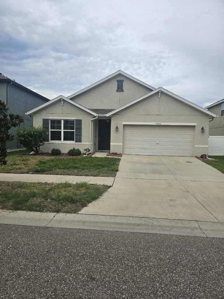 Photo of 10662 Park Meadowbrooke Drive, Riverview, FL 33578 (MLS # TB8519745)