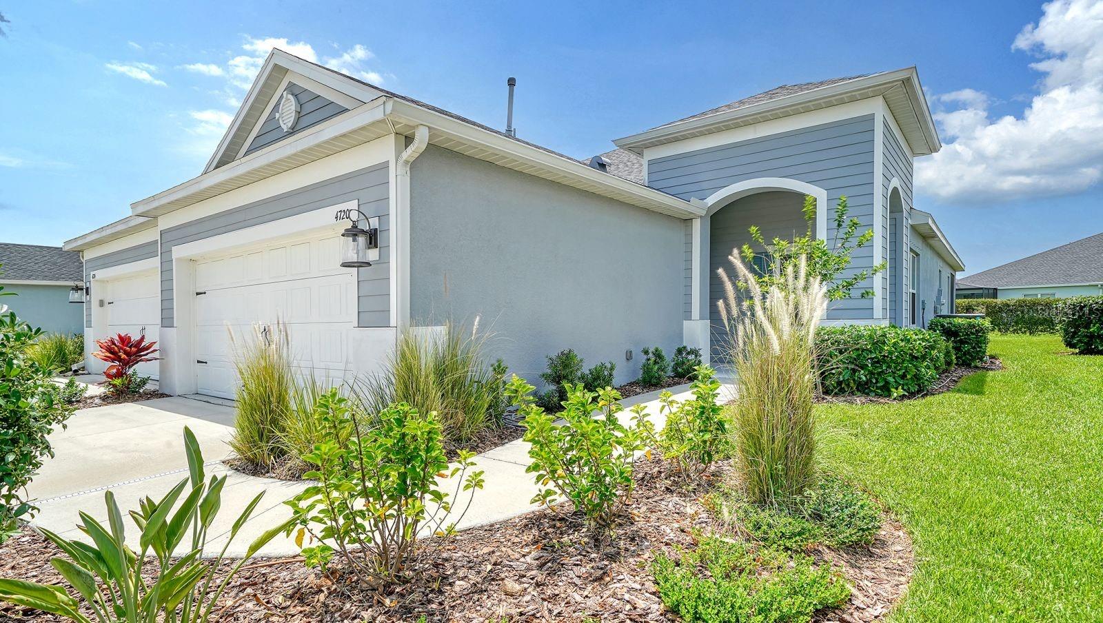 Discover the epitome of elegance in this beautifully bright villa, positioned on a premium interior lot with serene lake and lush landscaping views. Built by Neal Communities, this villa is in like new condition and exudes charm with its wood like tile throughout and 9'4" ceilings adorned with 8-foot doors. The living area features coffered ceilings that enhance the spacious feel of the open floor plan.
Upon entering, double doors lead you into a tiled den just off the foyer, perfect for a home office or cozy retreat. The kitchen and bathrooms boast continuity with white quartz countertops and cabinetry, complemented by trendy bronze and black lighting fixtures and fans.
The owner's suite is a true sanctuary, offering two closets, including a generous walk-in, dual separate vanities, and a beautifully tiled walk-in shower. The second bedroom also features a ceiling fan and walk-in closet for ample storage. Enjoy outdoor living in the extended, screened lanai equipped with a gas hookup for your grilling pleasure.
Canoe Creek offers residents exclusive amenities including two swimming pool- one with a hot tub, grilling area, and outdoor kitchen just steps away in the villa section. The gated community also boasts a large community center perfect for hosting events, a fire pit, pickleball courts, a dog park, and a full-time event coordinator. Villa members benefit from exterior maintenance and lawn mowing, freeing you to embrace the maintenance-free lifestyle.
Located in the vibrant area of Parrish, you are minutes away from shopping, dining, gyms, and stores, with easy commutes to St. Petersburg, Tampa, and Sarasota. Come and experience the perfect blend of luxury and convenience in this stunning villa.