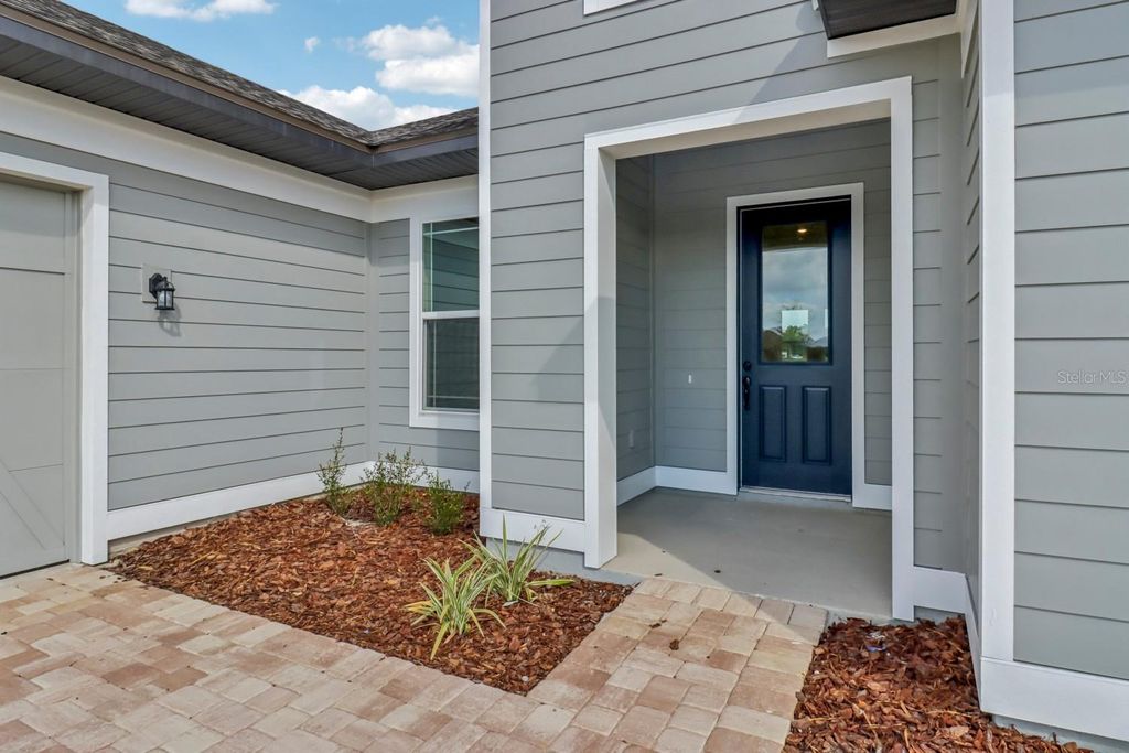 Photo of 422 Junonia Blvd, New Smyrna Beach, FL 32168 (MLS # TB8428685)