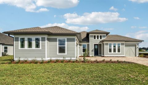Photo of 422 Junonia Blvd, New Smyrna Beach, FL 32168 (MLS # TB8428685)