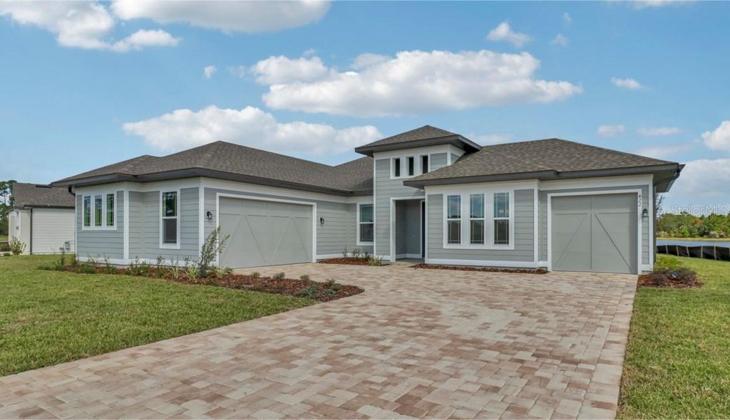Photo of 422 Junonia Blvd, New Smyrna Beach, FL 32168 (MLS # TB8428685)