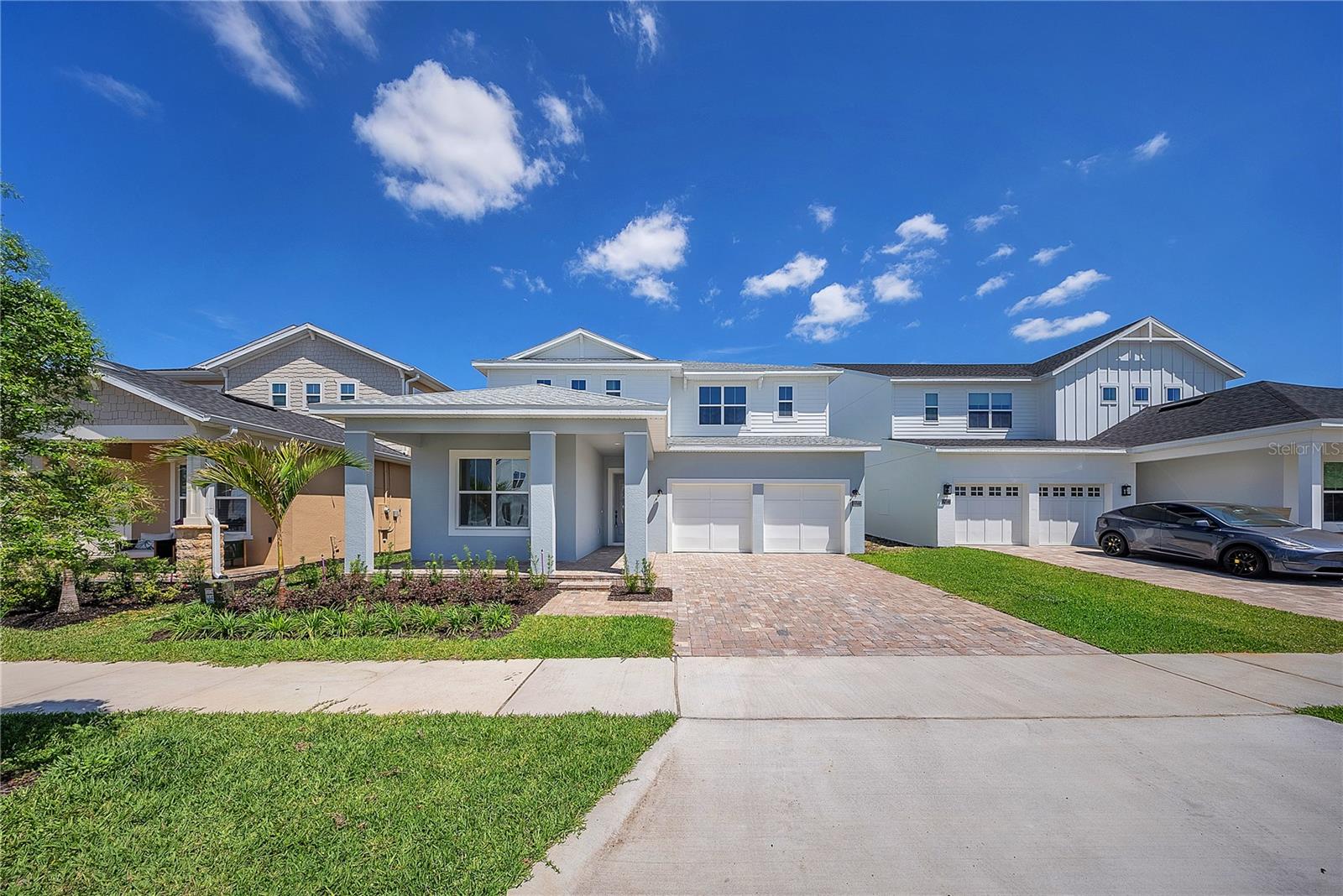 Discover modern elegance and timeless luxury in this exceptional new construction home by Toll Brothers. This residence boasts sophisticated upgrades throughout, a well-distributed formal floor plan with a separate formal dining room, and a well-appointed kitchen featuring a walk-in pantry and open views of breakfast area and great room. Designed for comfort and entertaining, the great room extends to a covered lanai, creating a seamless indoor-outdoor living experience with a private pool overlooking a pond and conservation area. Upstairs, the expansive primary suite features a large walk-in closet and a spa-inspired bath with a free-standing tub with a view, a separate shower and a private toilet area. Experience luxury, comfort and versatility in this thoughtfully designed home.
