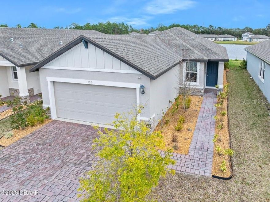 Do not miss this amazing opportunity to own a practically NEW, energy-efficient 2023 home that has been barely lived in PLUS it is FULLY Furnished! This crisp design package sits on a beautiful pond lot with peaceful views from the great room and the Primary Suite. The chef-inspired kitchen overlooks the open living space, making it perfect for everyday living and entertaining. The living room furniture includes all recliners ideal for relaxing or hosting guests. Built by Meritage Homes, this home features smart home technology including a smart thermostat, smart front door lock, video doorbell, smart garage opener/app control, and a smart home hub. Enjoy energy-saving upgrades such as low-E windows, energy-efficient HVAC, and home sealing with improved ventilation. Everything is 2023 and truly move-in ready! Schedule your private showing today—this one won't last long, especially fully furnished!

Enjoy an unbeatable location just a short 5-minute walk to the beautiful LPGA Country Club, offering two 18-hole championship golf courses, a pool, and on-site dining. Tucked away in a quiet and convenient setting, you'll love being just minutes to I-4 and I-95 for easy travel to cruise ports and international airports. Spend your days at the beach with Daytona and Ormond only 10 miles away, plus New Smyrna Beach's popular dining and wine scene nearby. Close to everything including Tanger Outlets, PopStroke, Buc-ee's, Publix, Trader Joe's, Costco, Sam's Club, and Sprouts coming soon. Nearby schools include Embry-Riddle, Daytona State College, Bethune-Cookman, UCF, Stetson, and more. Plus, enjoy world-famous attractions like NASCAR, Rolex 24 and Daytona International Speedway, with Orlando, Jacksonville, St. Augustine, and theme parks all within an hour or less!