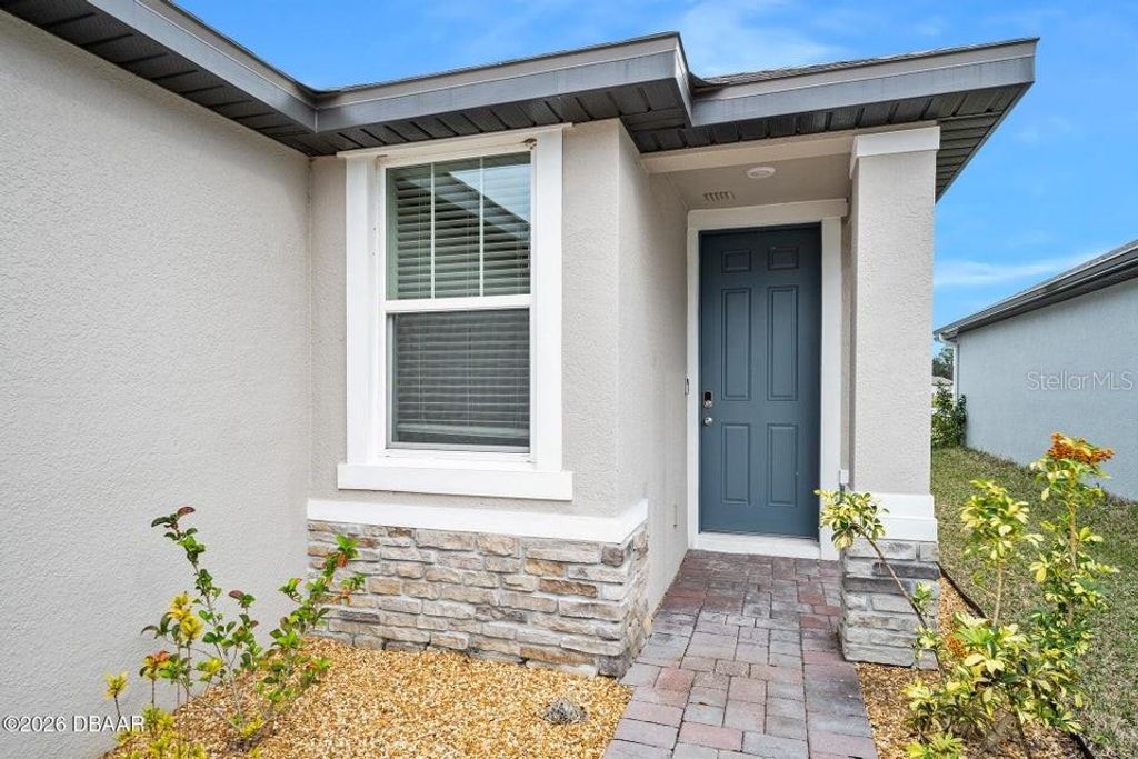 Photo of 132 Links Terrace Boulevard, Daytona Beach, FL 32124 (MLS # FC315359)