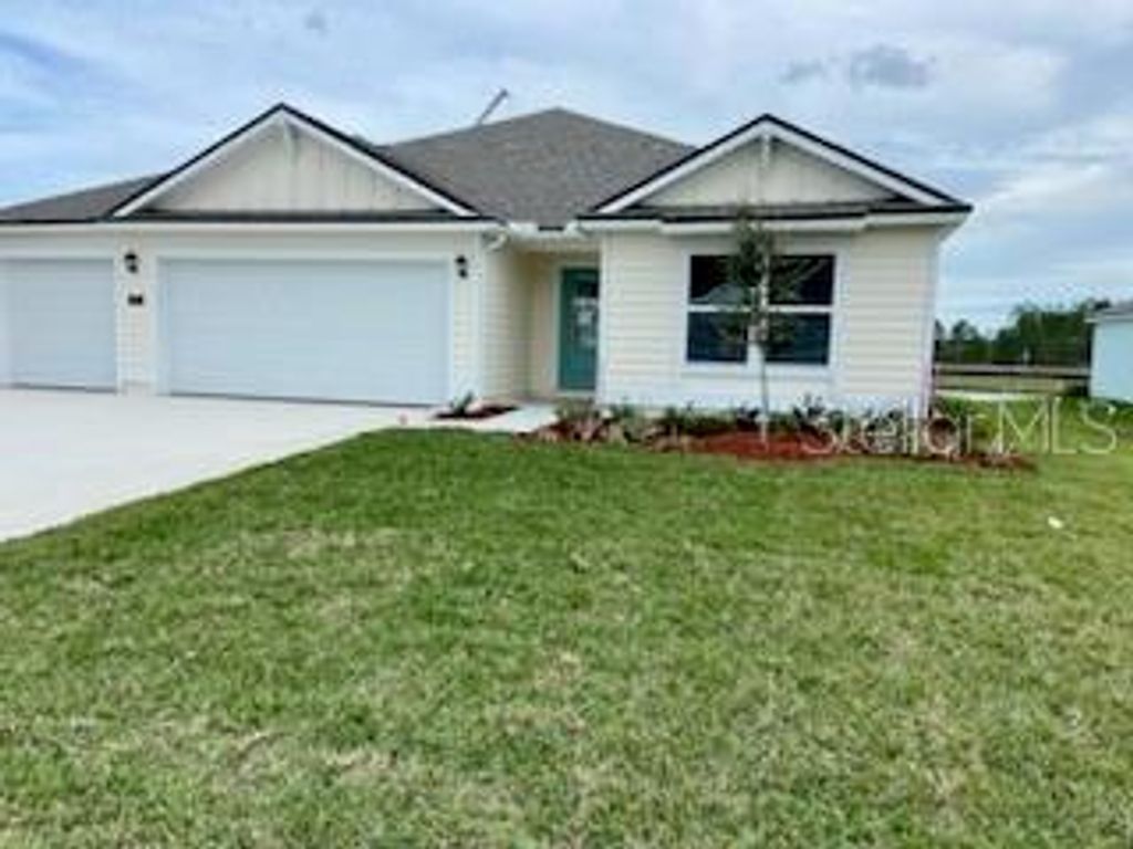 Photo of 23 Lumber Jack Trail, Palm Coast, FL 32137 (MLS # FC297971)
