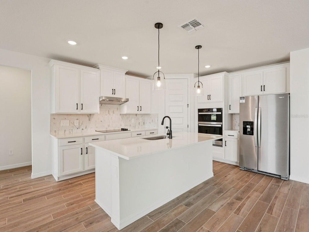 Photo of 10842 Budding Blossom Court, Parrish, FL 34219 (MLS # TB8550579)