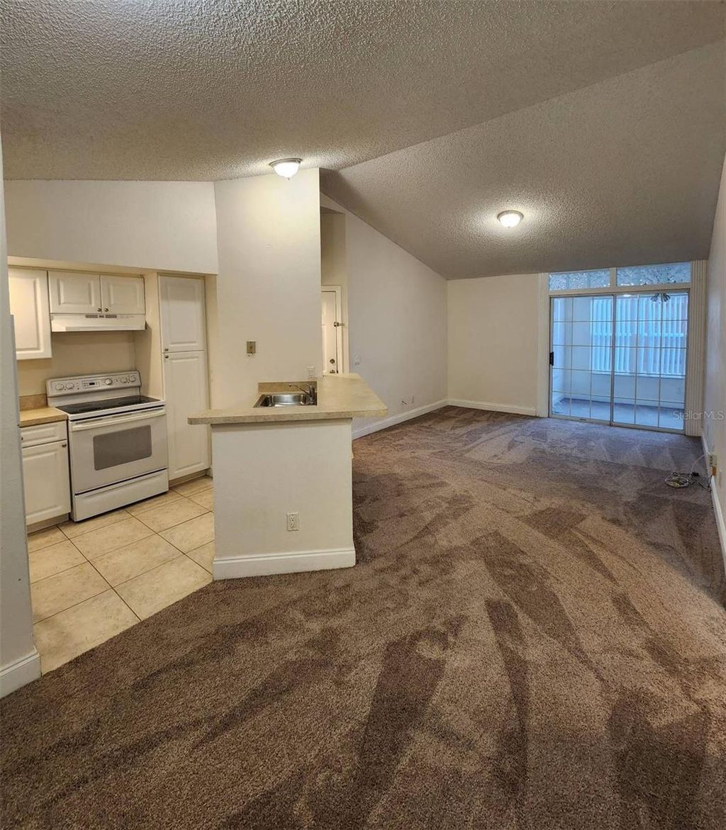 Photo of 5737 Gatlin Avenue #423, Orlando, FL 32822 (MLS # S5145663)